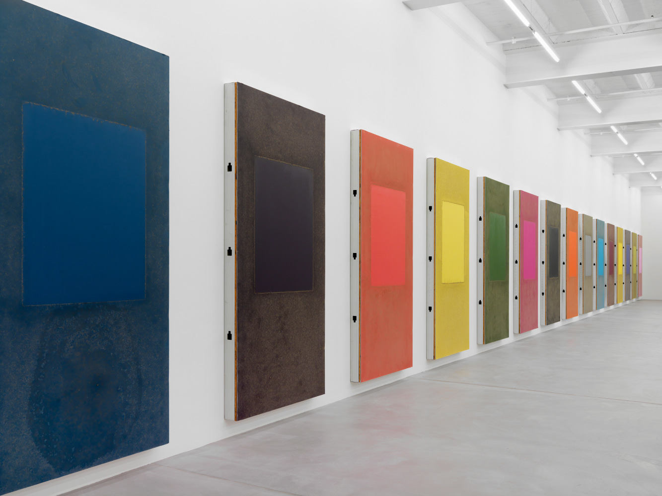 Installation view of Sam Falls paintings and sculptures exhibition