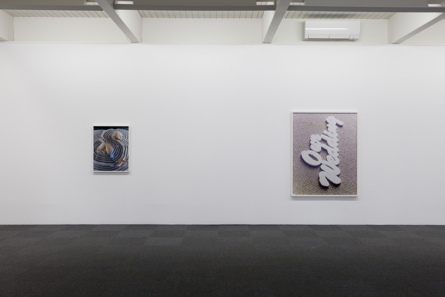 Installation view of photographs by Torbjørn Rødland