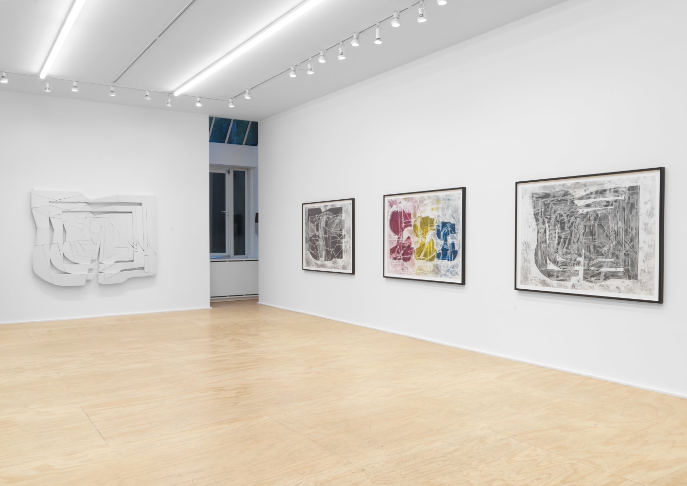 Installation view of Wyatt Kahn wall reliefs and works on paper