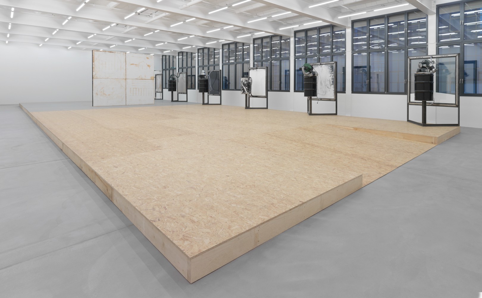 Installation view of Oscar Tuazon sculptures and floor installation exhibition
