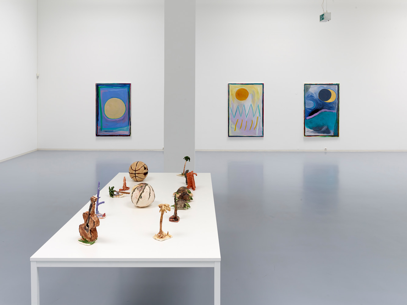 Installation view of sculptures and paintings by Josh Smith