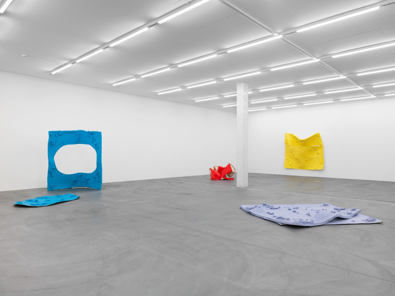 Installation view of Alex Hubbard sculptural paintings and film exhibition