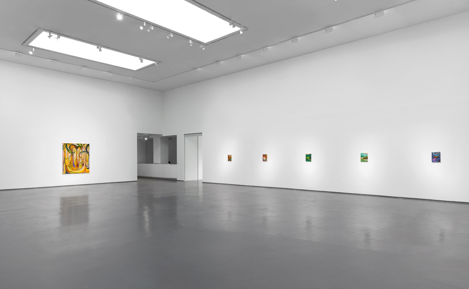 Installation view of paintings by Shara Hughes