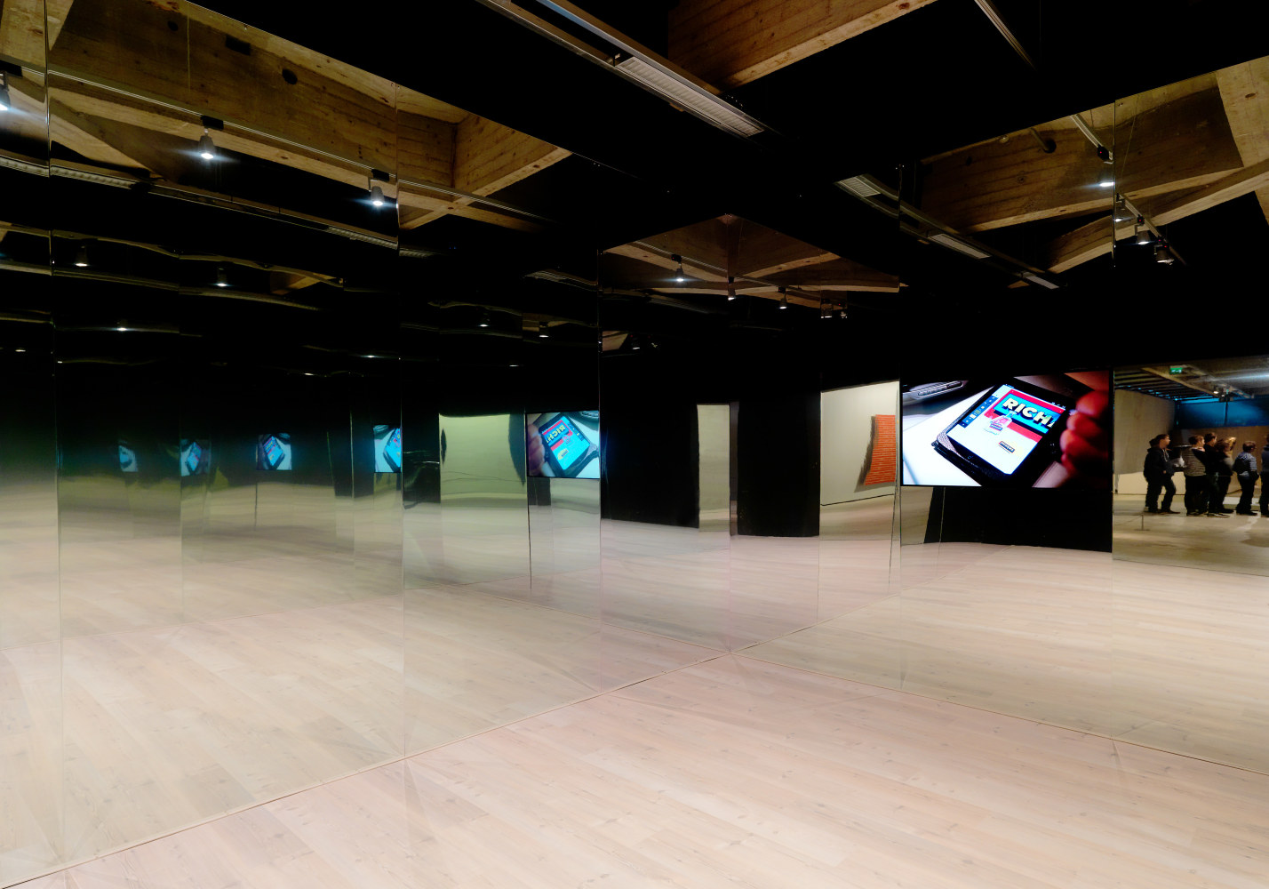 Installation by Liam Gillick, Hamilton 2014 HD video, screen, mirrored room 27:43 min Dimensions variable