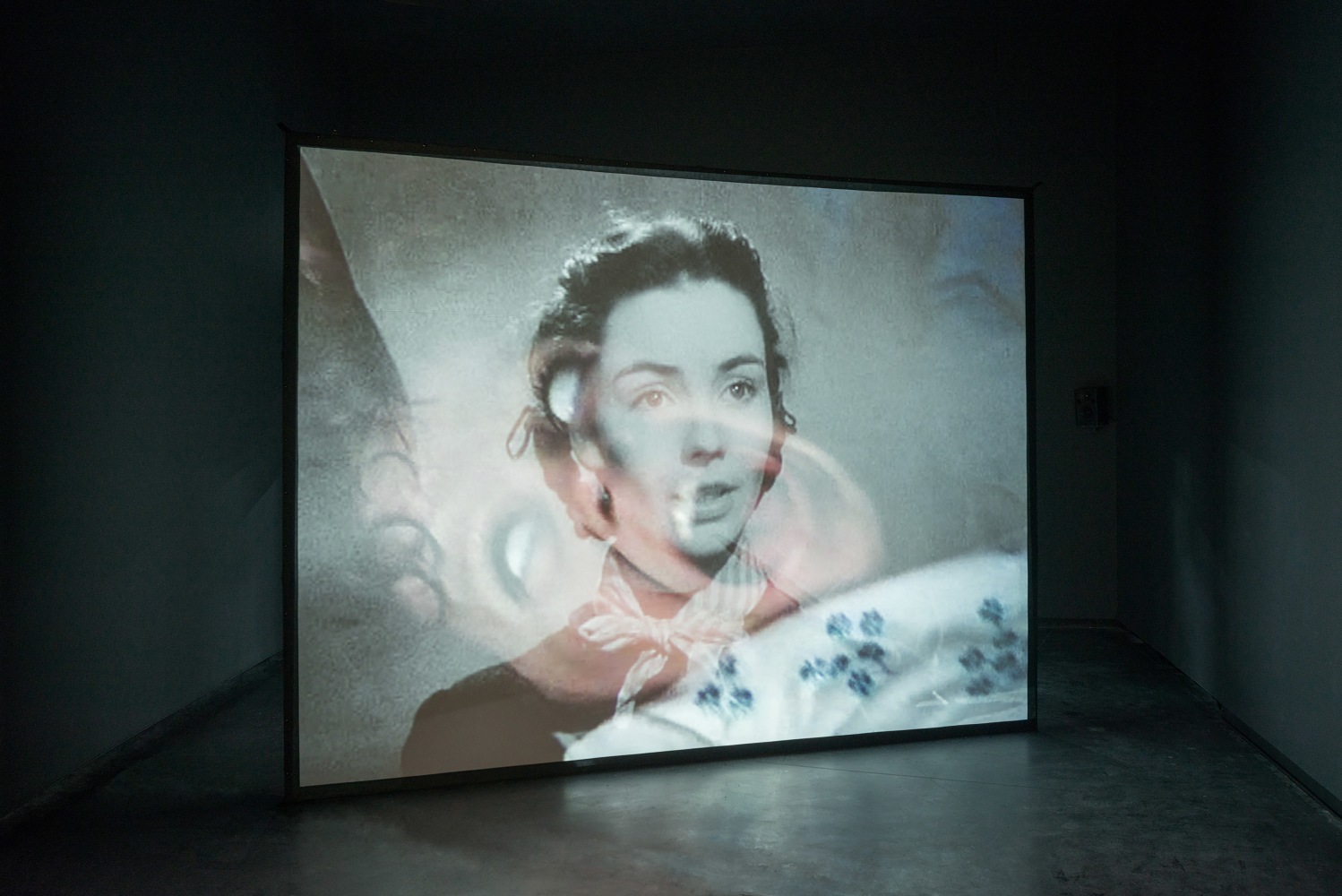 Installation view of video work by Douglas Gordon