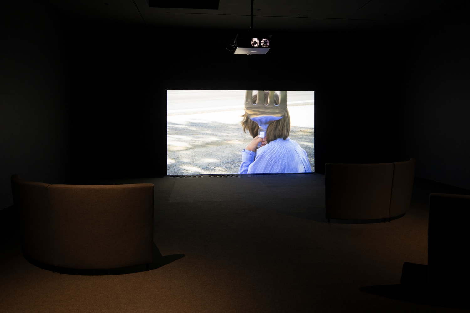 Installation view of video installation by Torbjørn Rødland