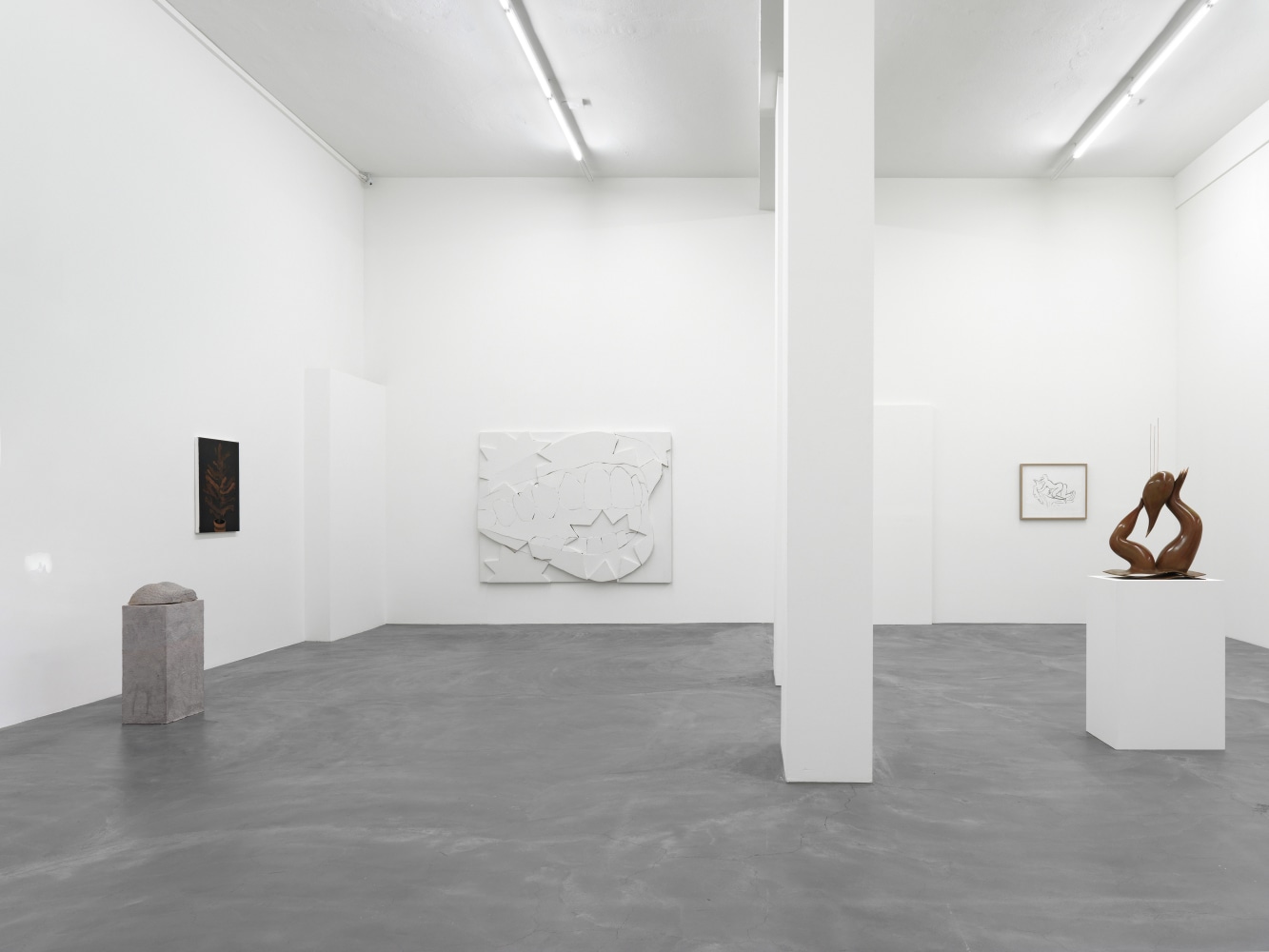 Installation view of paintings and sculptures group exhibition