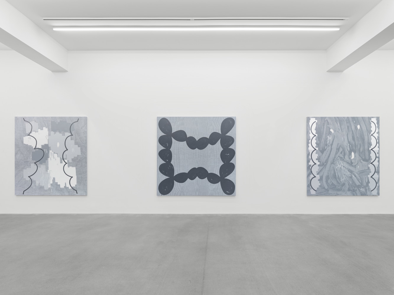 installation view of grayscale paintings by Amy Feldman