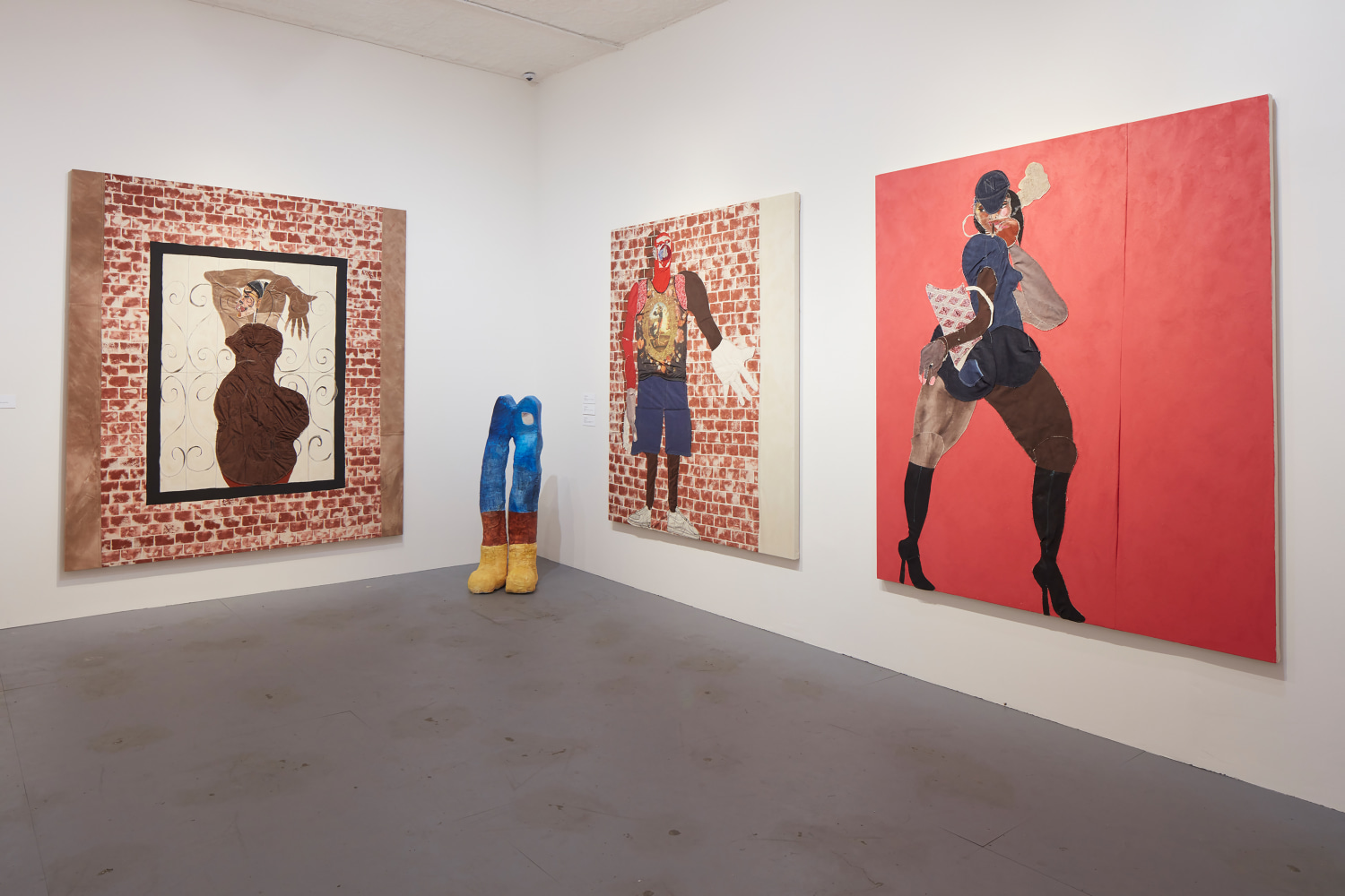 Installation view of paintings and sculptures by Tschabalala Self