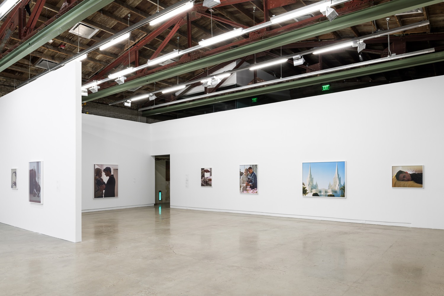 Installation view of photographies by Torbjørn Rødland