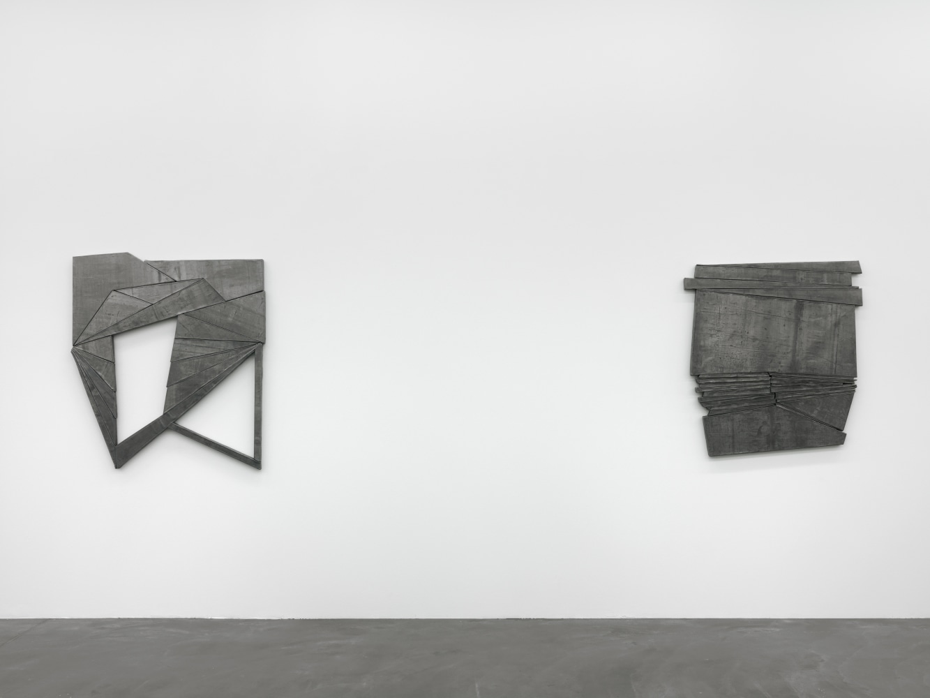 Installation view of Wyatt Kahn wall reliefs and photographs