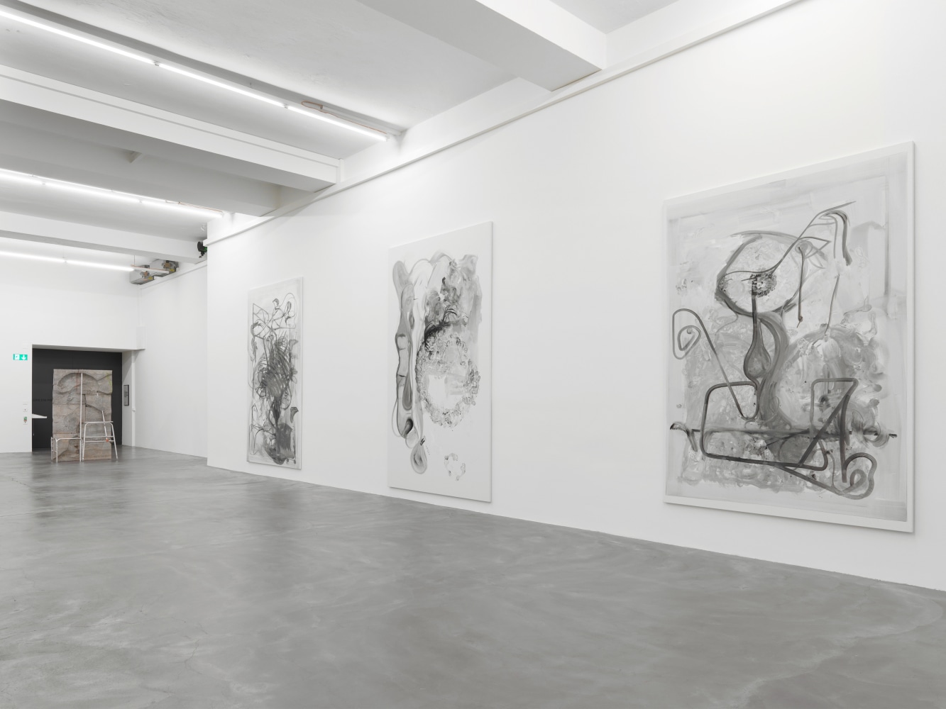 Installation view of paintings and sculptures group exhibition