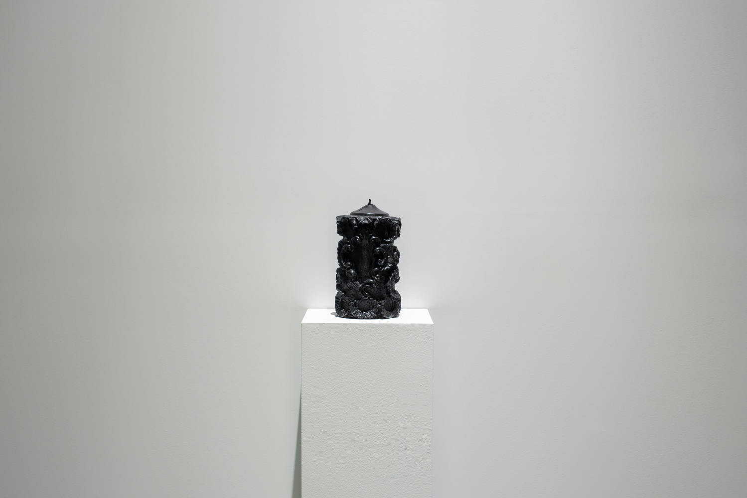 Installation view of sculptures by Peter Fischli and David Weiss and works by Wade Guyton