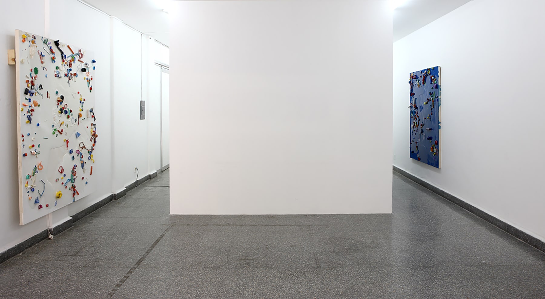 Installation view of paintings by Alex Hubbard