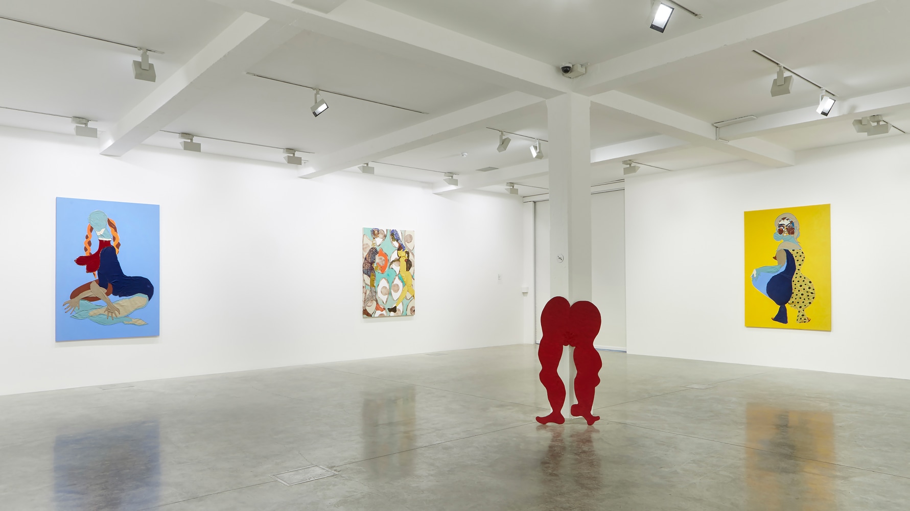 Installation view of paintings and sculptures by Tschabalala Self
