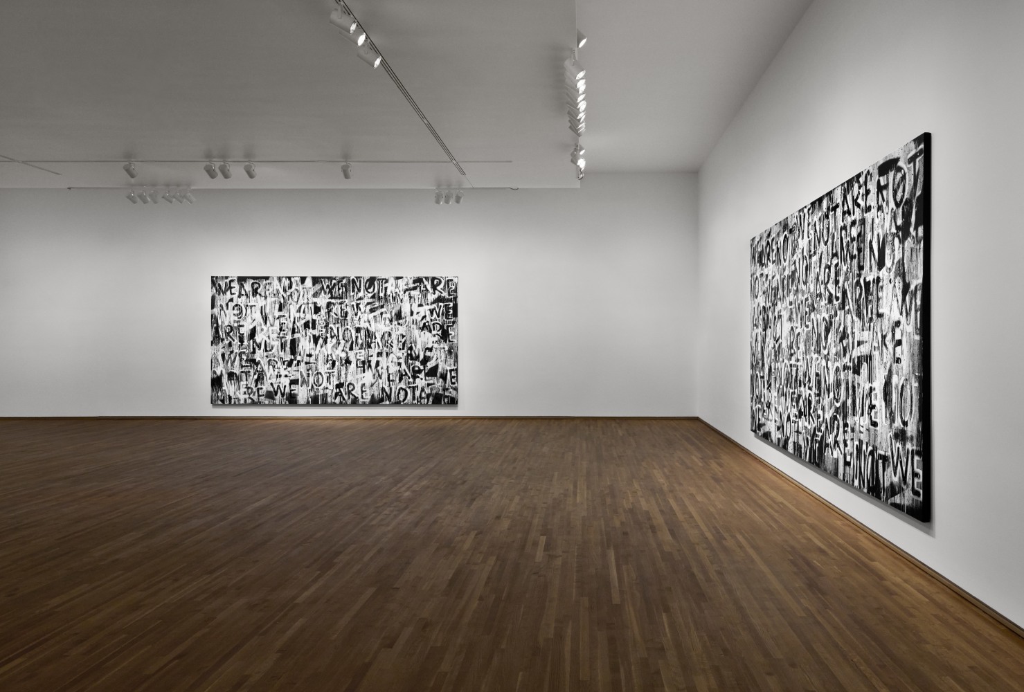 Installation view of black and white paintings by Adam Pendleton