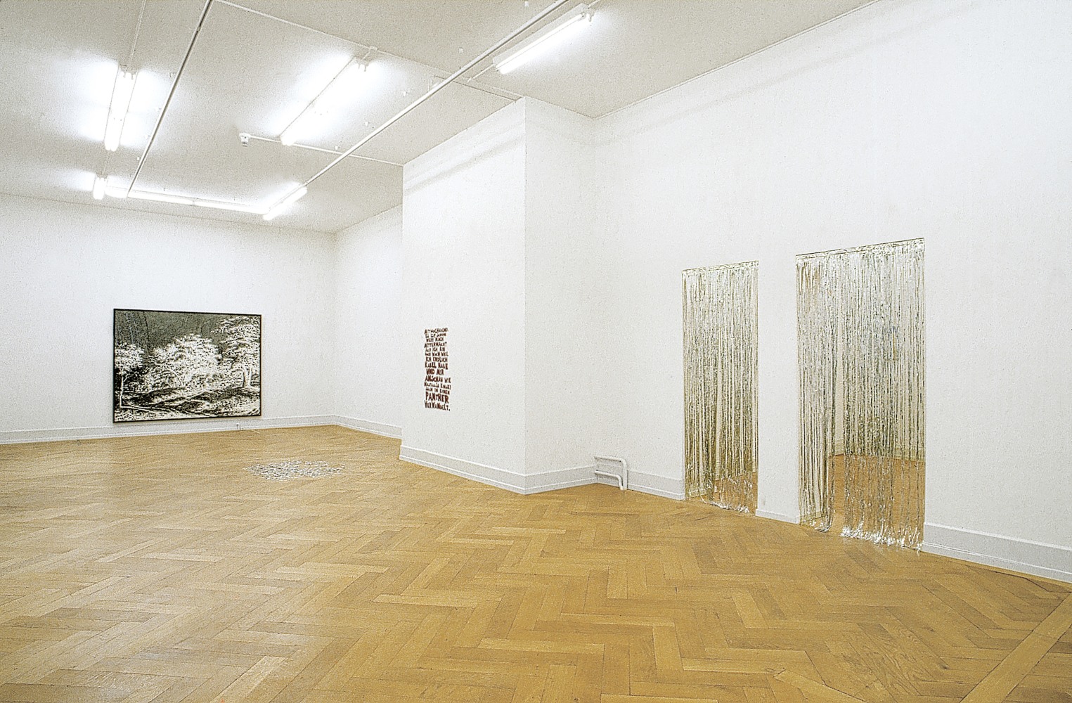 Installation view of paintings and wall works by Ugo Rondinone