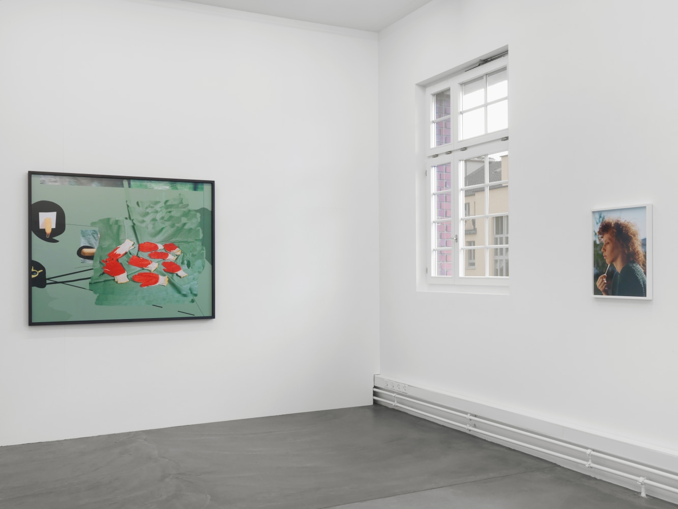 Installation view of group painting, photography, and sculpture exhibition