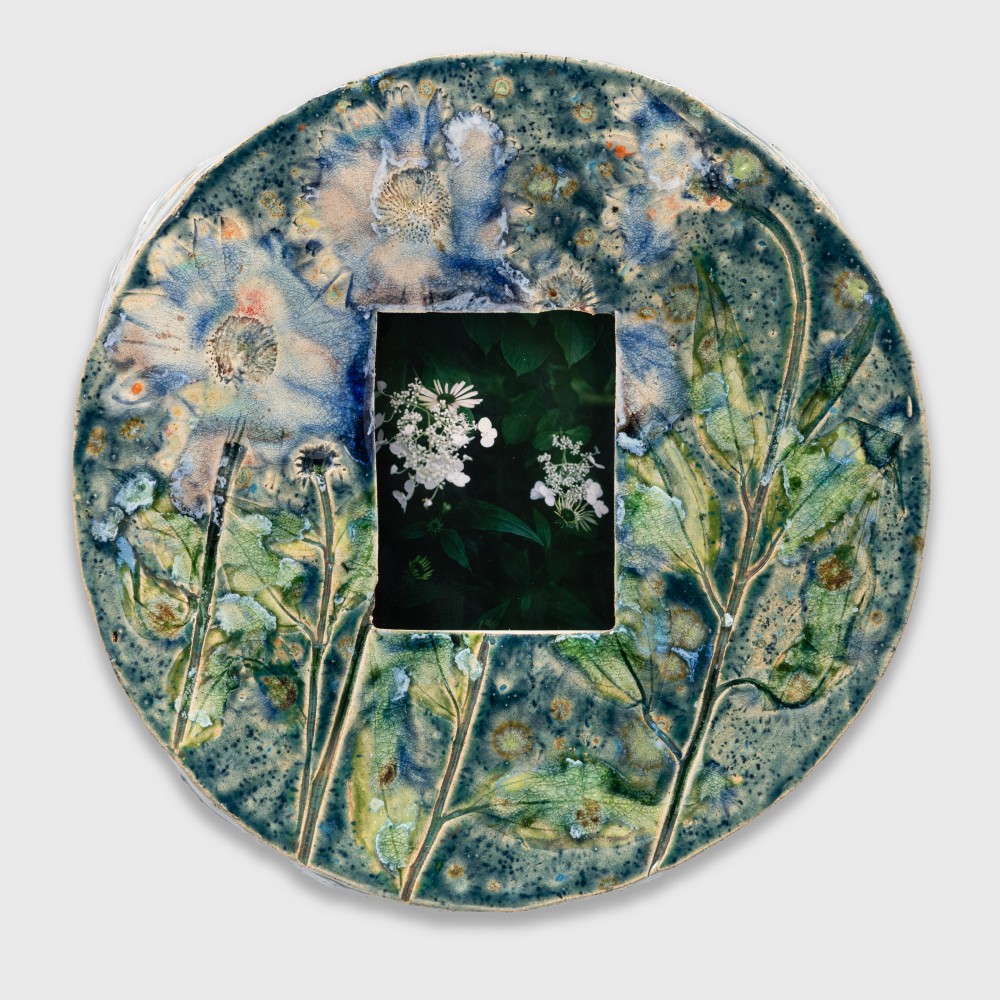 photography in a ceramic artist frame by Sam Falls