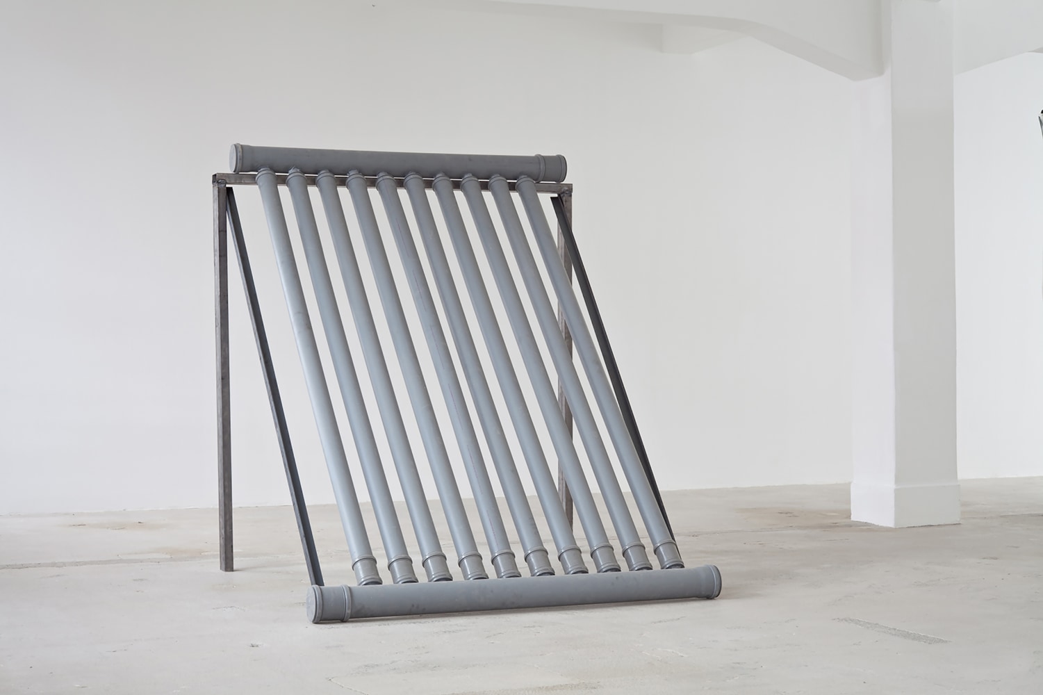 Installation view of sculptures by Oscar Tuazon