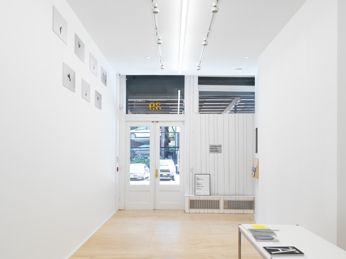 Installation view of photographs by Shannon Ebner