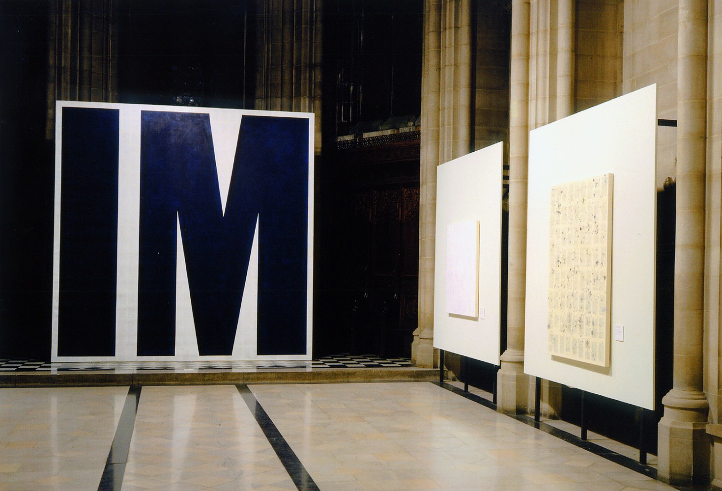 Installation view of paintings by Tim Rollins and K.O.S.