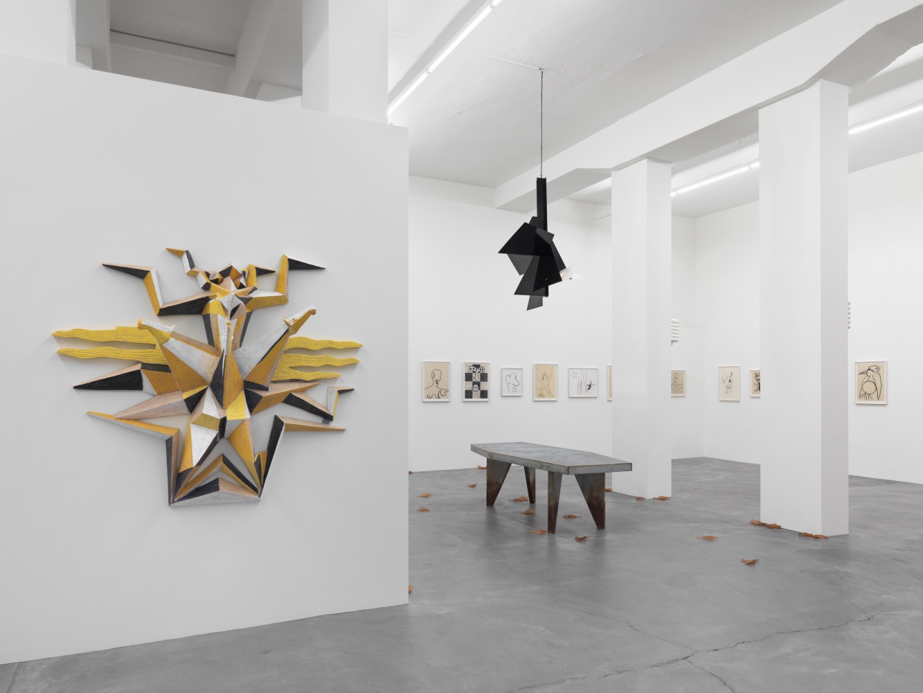 Installation view of paintings and sculptures group exhibition