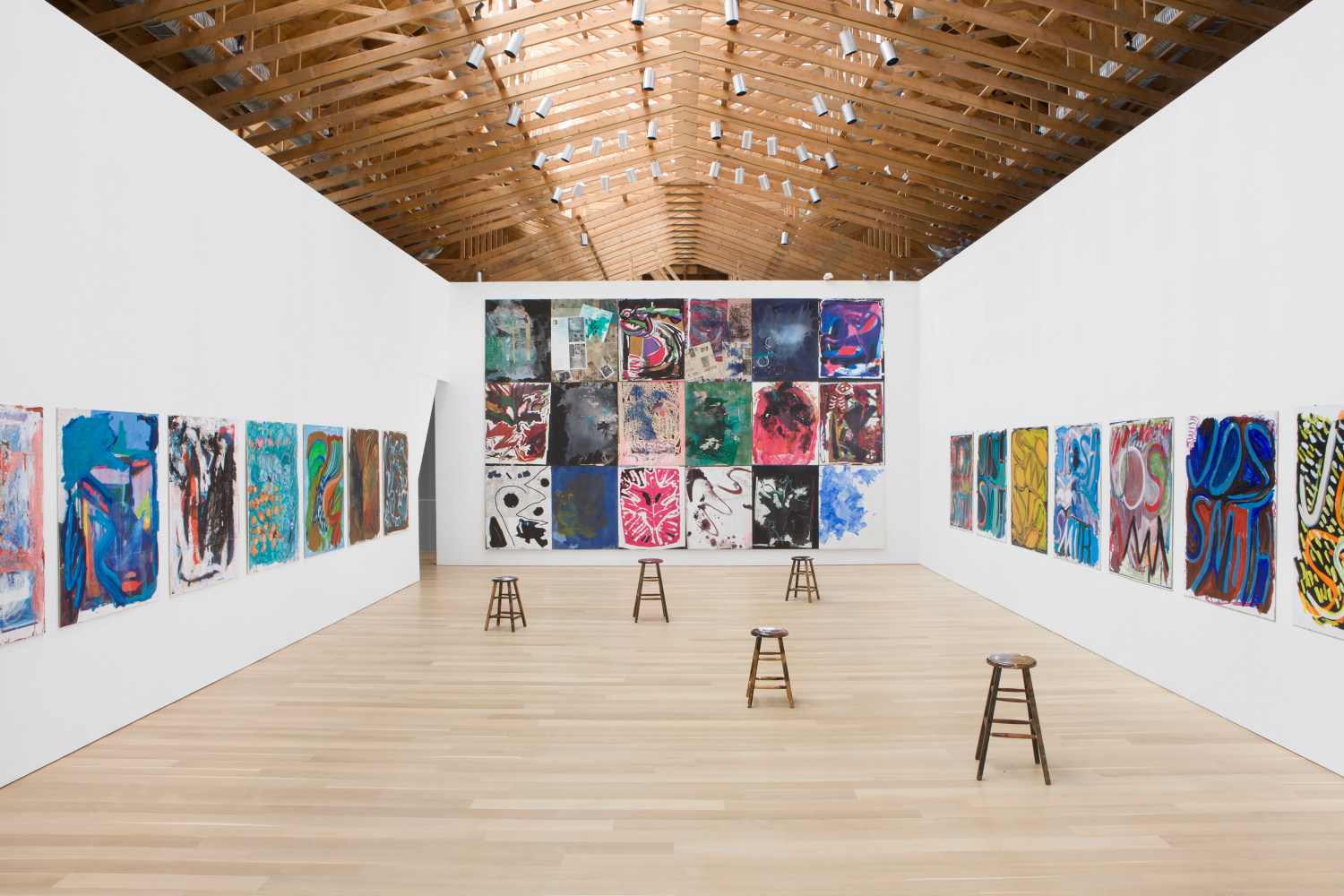 Installation view of paintings by Josh Smith