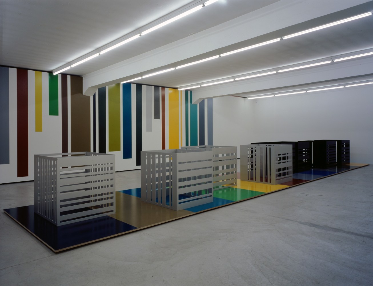 Installation view of Liam Gillick wall-based graphic work and sculpture exhibition