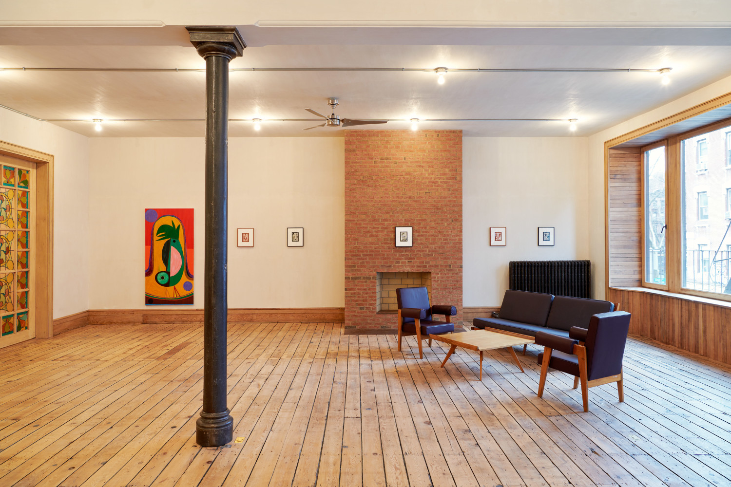 Installation view of paintings and drawings by Austin Eddy