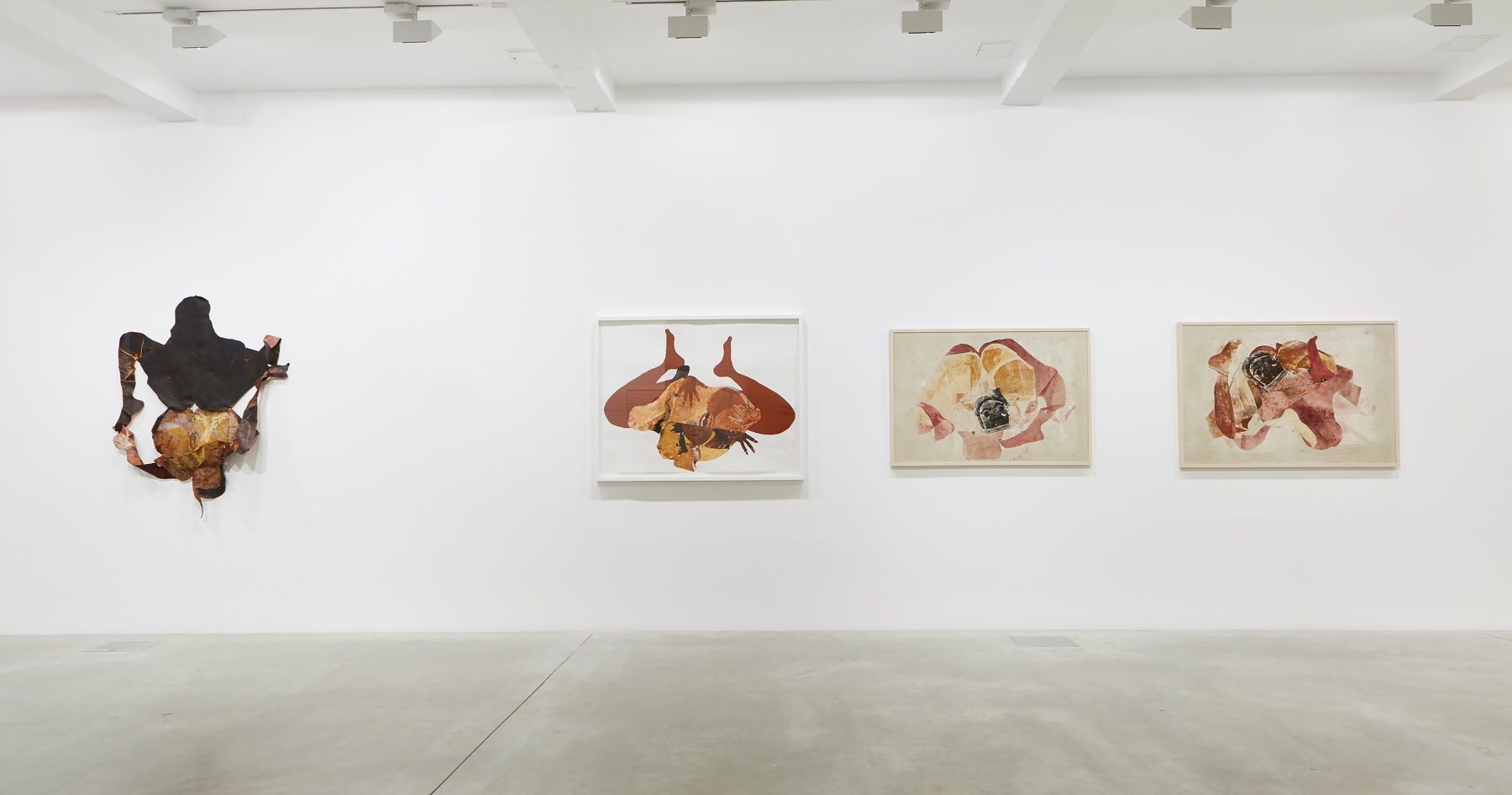Installation view of paintings by Tschabalala Self