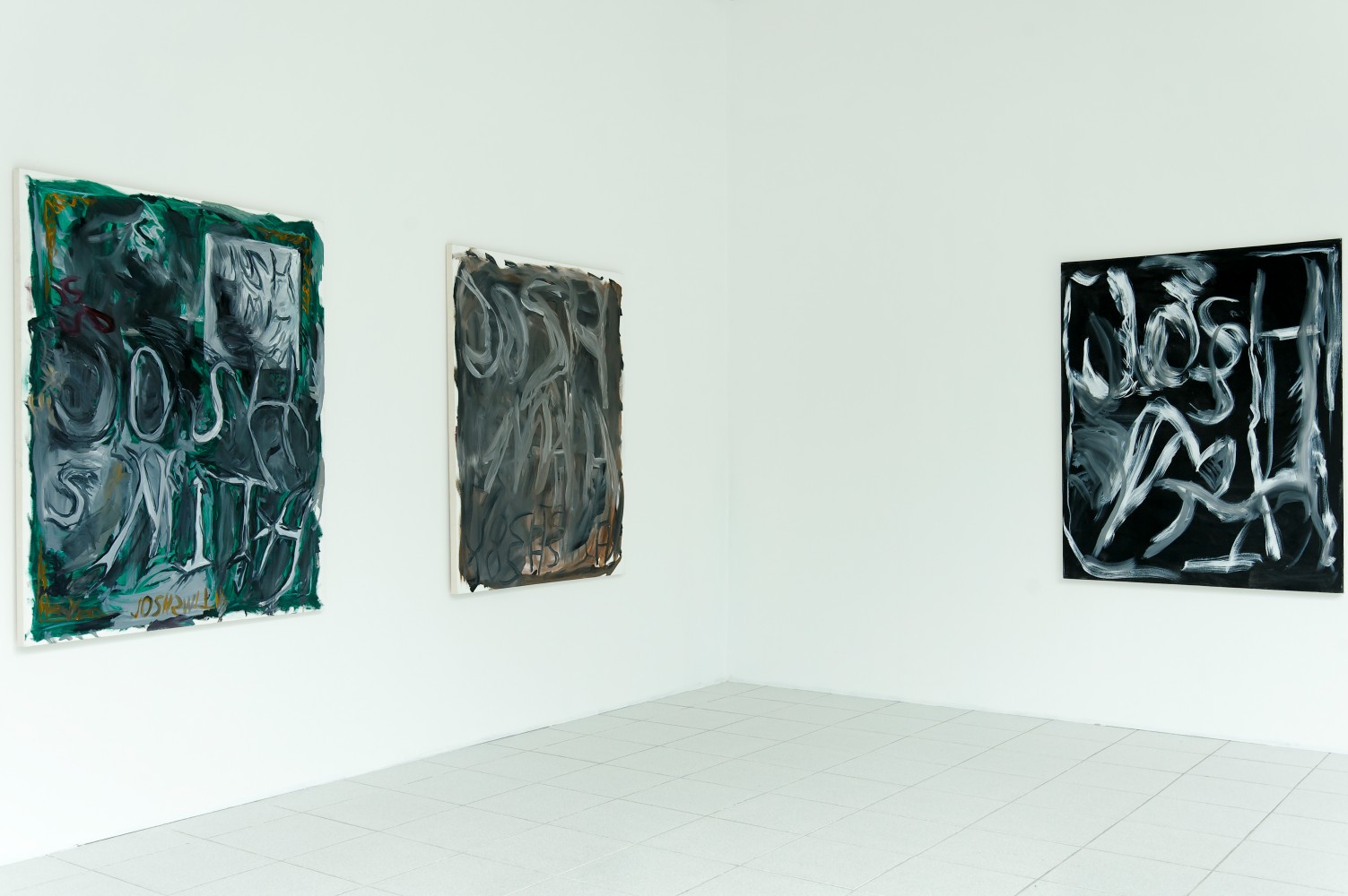 Installation view of paintings by Josh Smith