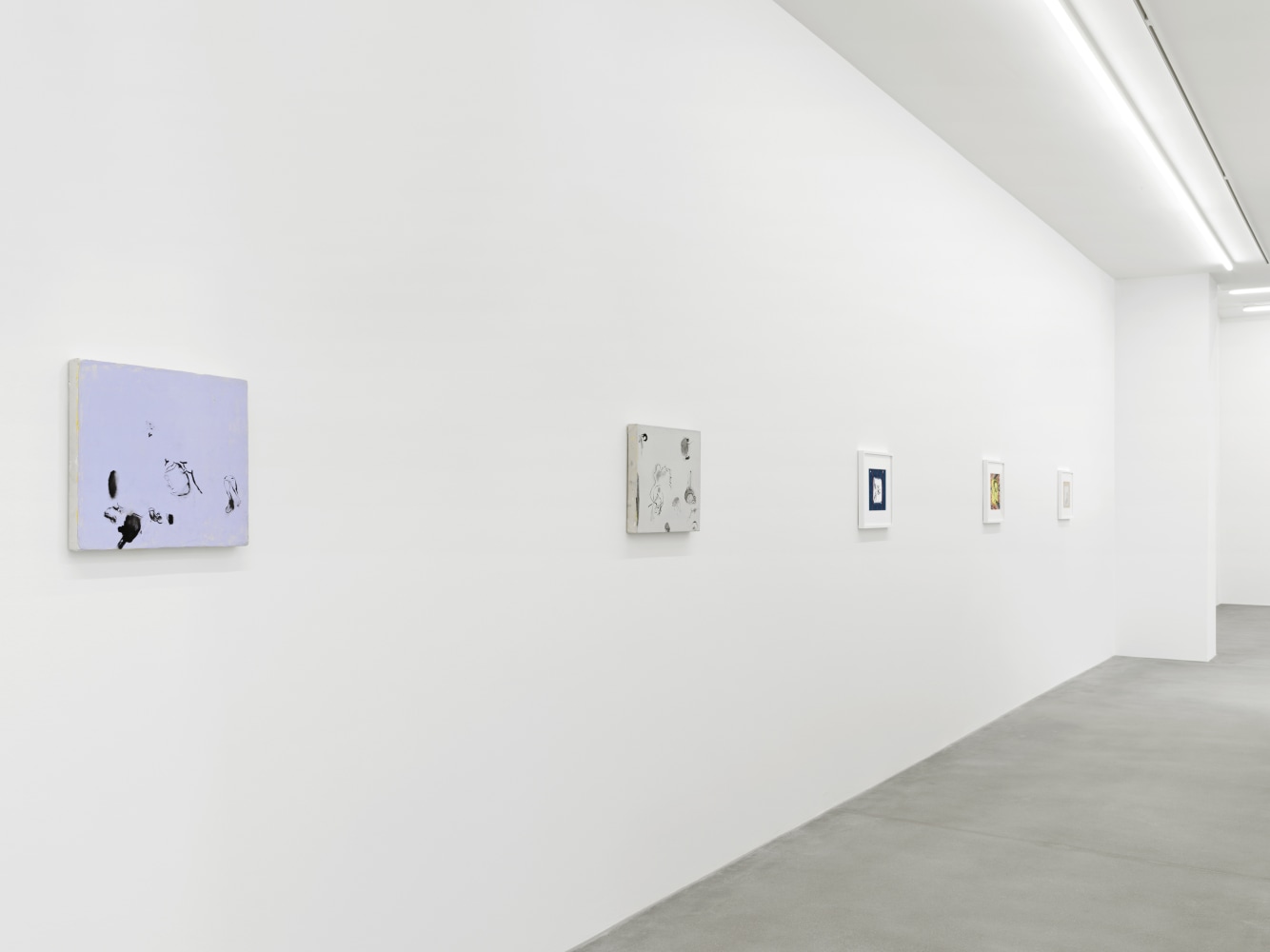 Installation view of Sue Williams painting and collage exhibition