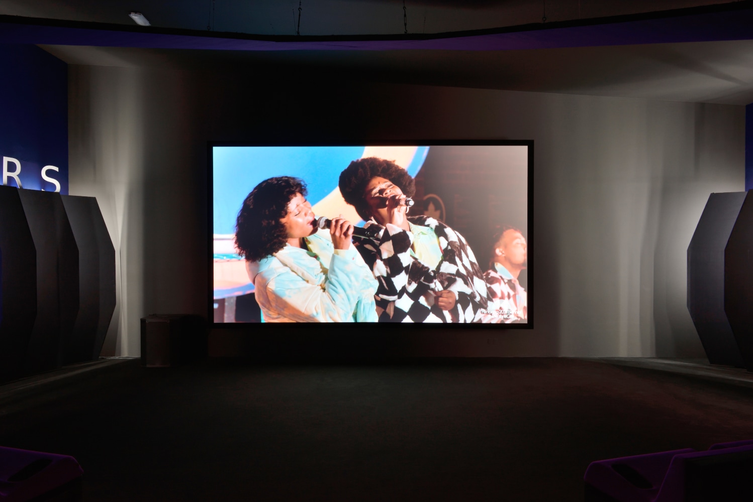 Installation view of a video screening by Tschabalala Self