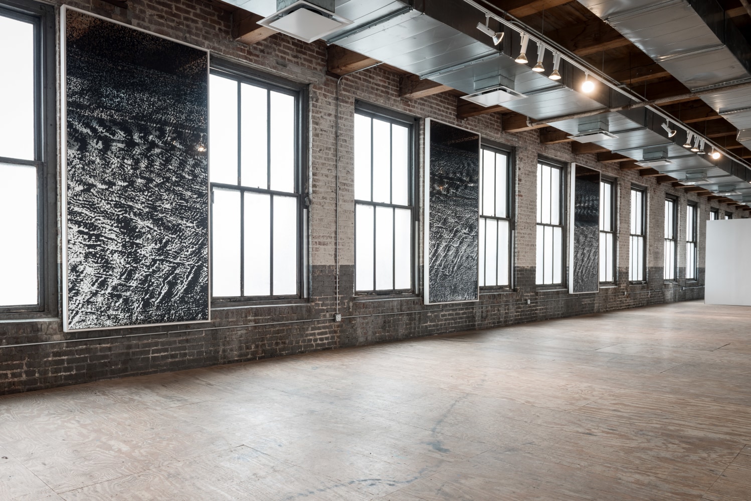 Installation view of paintings by Adam Pendleton