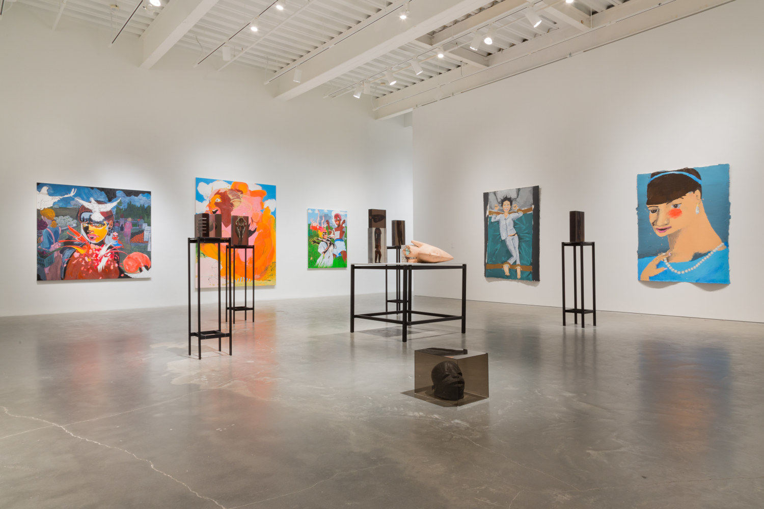 Installation view of sculptures by Matthew Angelo Harrison and works by other artists