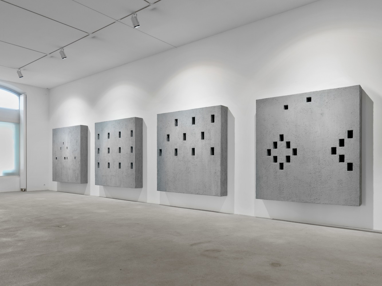 Installation view of wall works by Valentin Carron