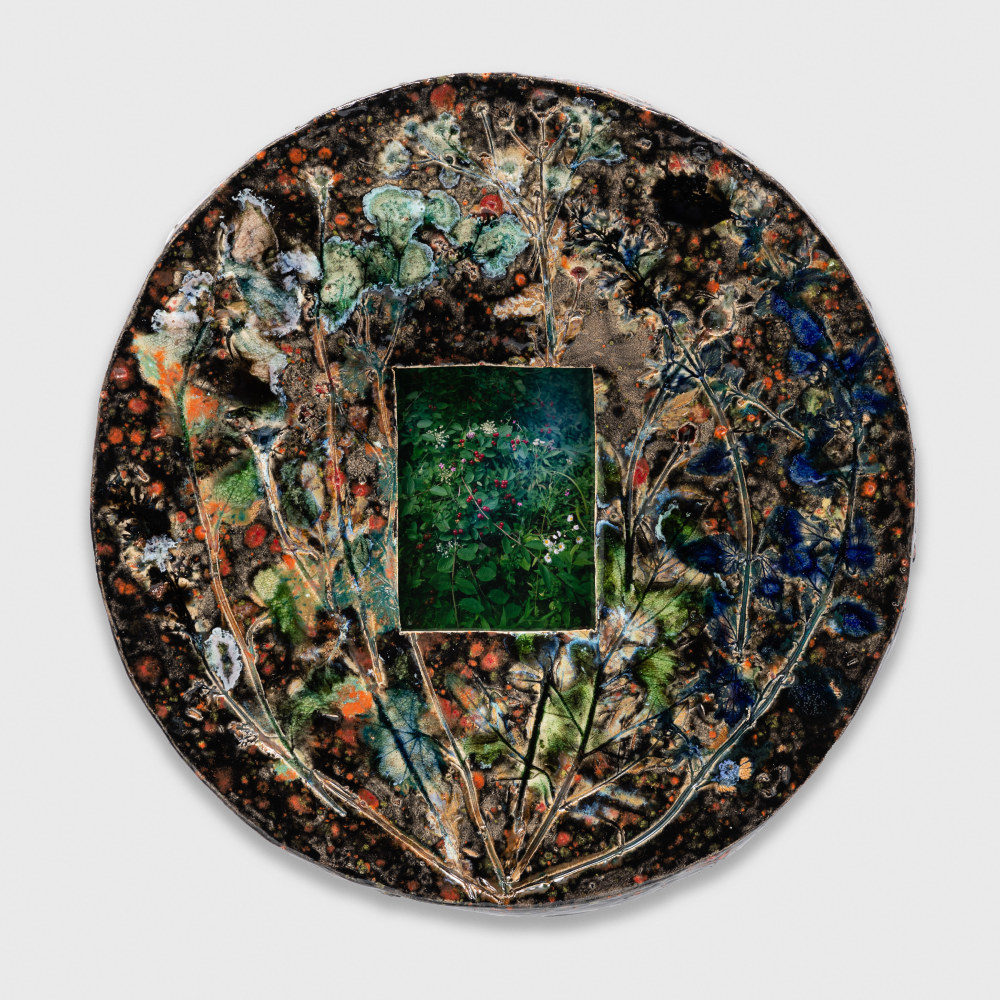 photography in a ceramic artist frame by Sam Falls