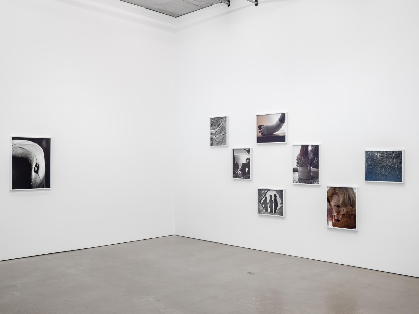 Installation view of photographs by Torbjørn Rødland