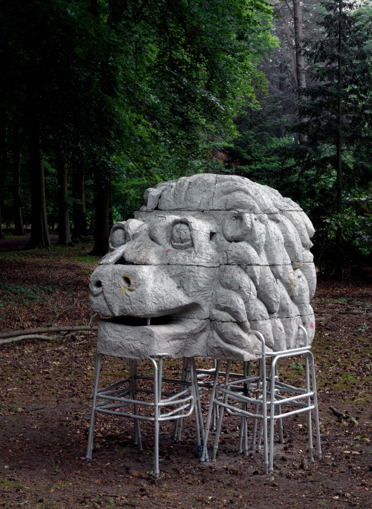 Outdoor view of Justin Matherly sculpture, Cost of Living; mob above, mob below (w.t.n.c.g.l.) 2013 Concrete, ambulatory equipment, spray paint, water-based marker, stainless steel hardware, zip ties 214 x 159 x 152 / 84 1/4 x 62 1/2 x 59 3/4 in