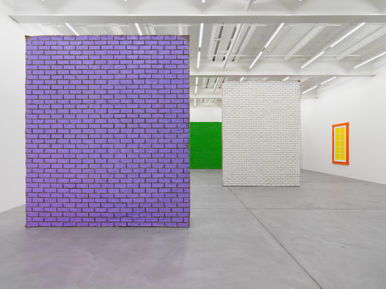 Installation view of Ugo Rondinone brick wall paintings exhibition