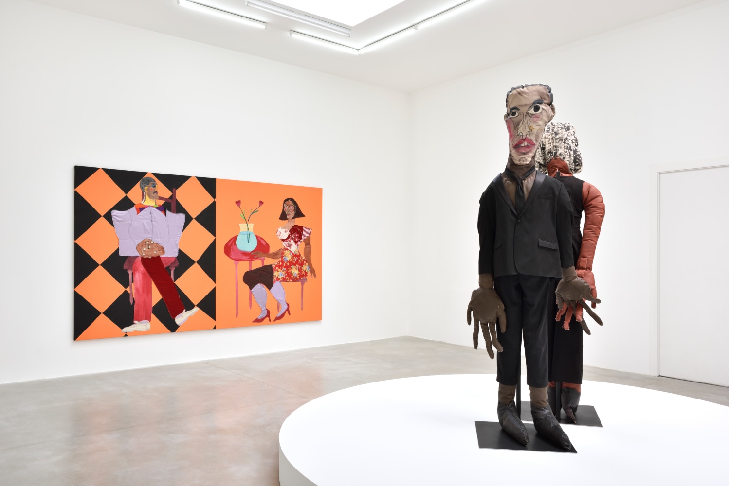 Installation view of paintings and sculptures by Tschabalala Self