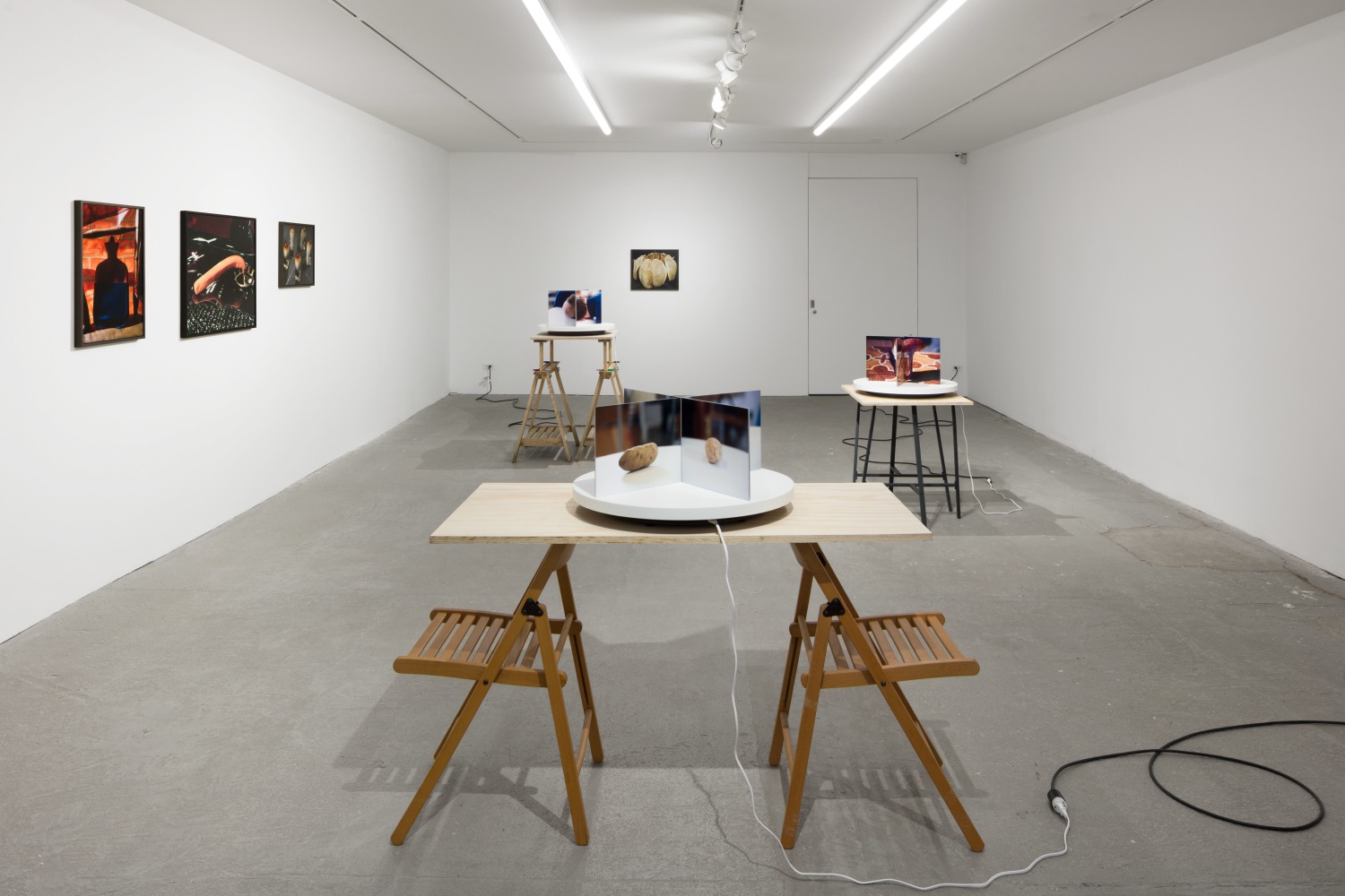 Installation view of Lucas Blalock photography and sculpture exhibition