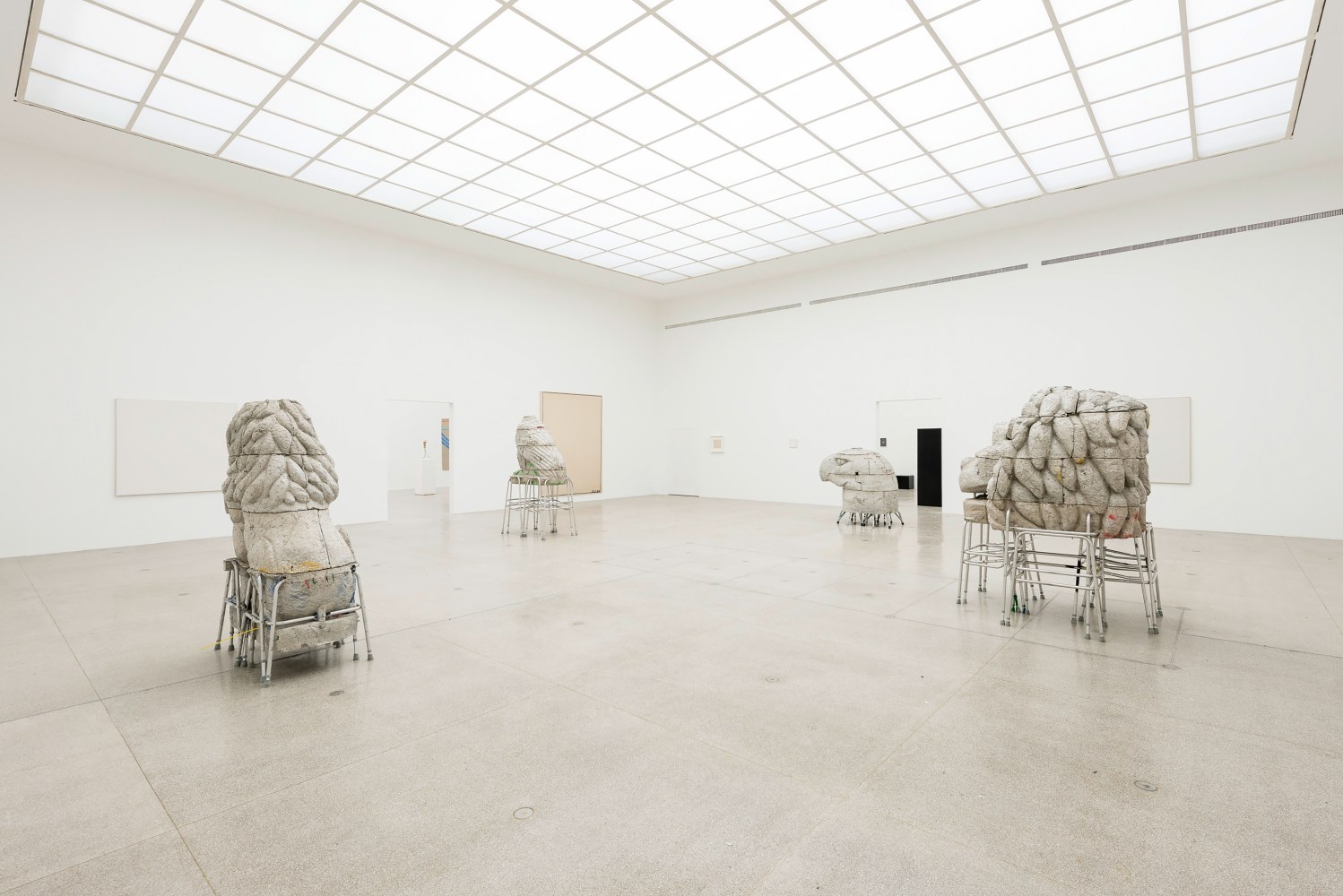 Installation view of sculptures by Justin Matherly and various works by other artists