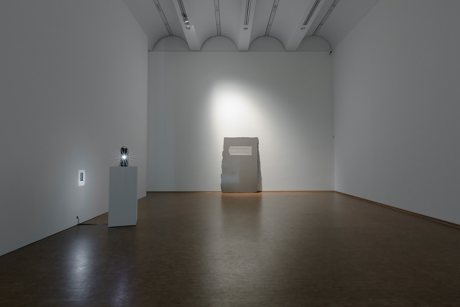 Installation view of videos and sculptures by Trisha Donnelly