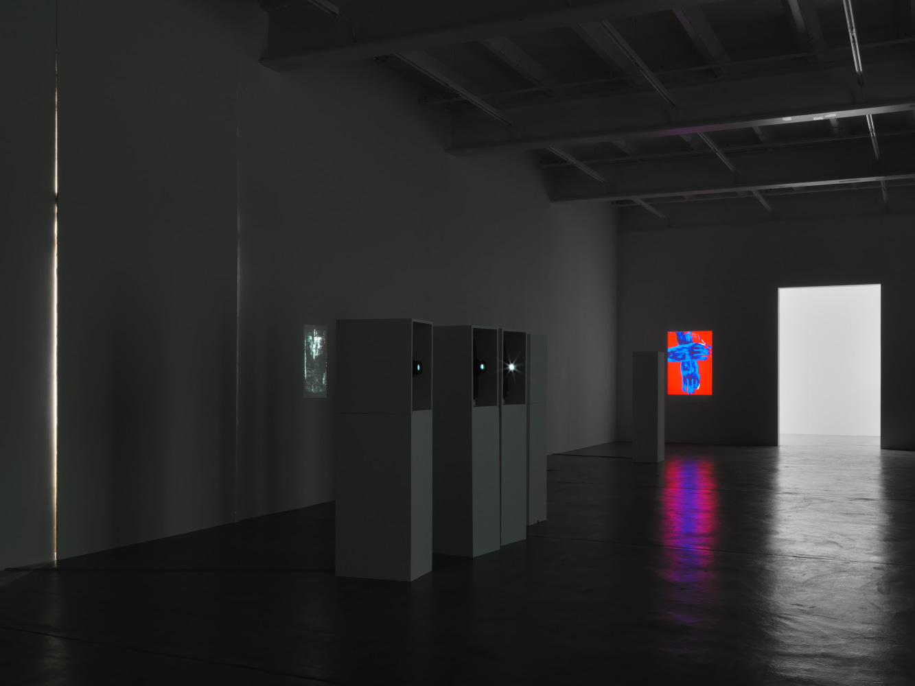 Installation view of Trisha Donnelly light and film installations