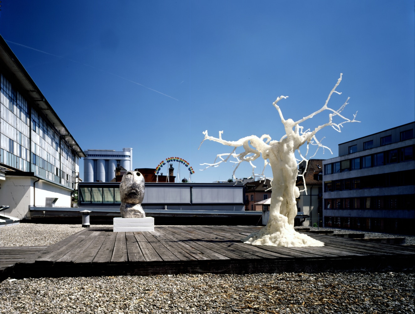 Outdoor view of sculptures by Ugo Rondinone