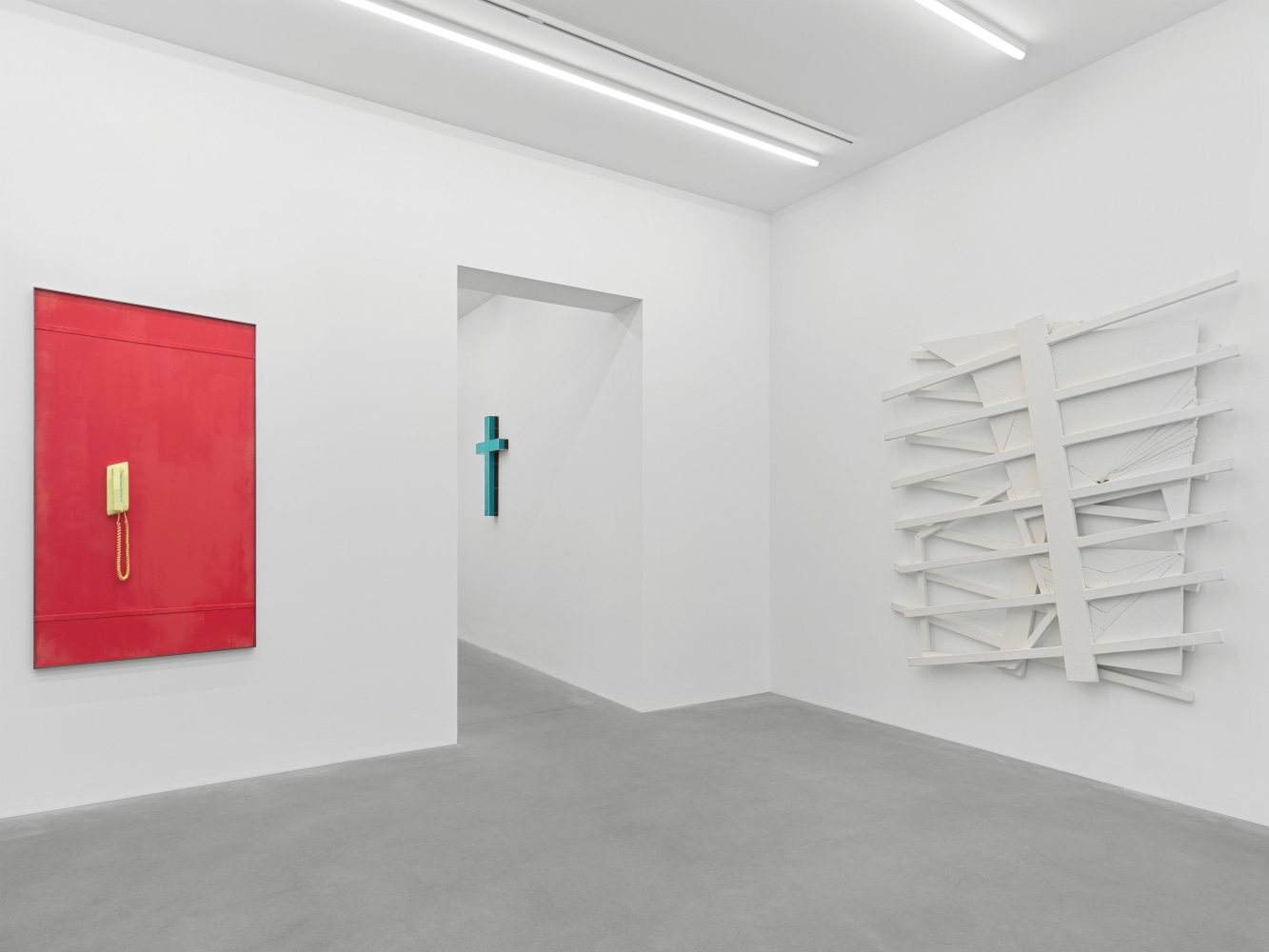 Installation view of group painting, print, and sculpture exhibition