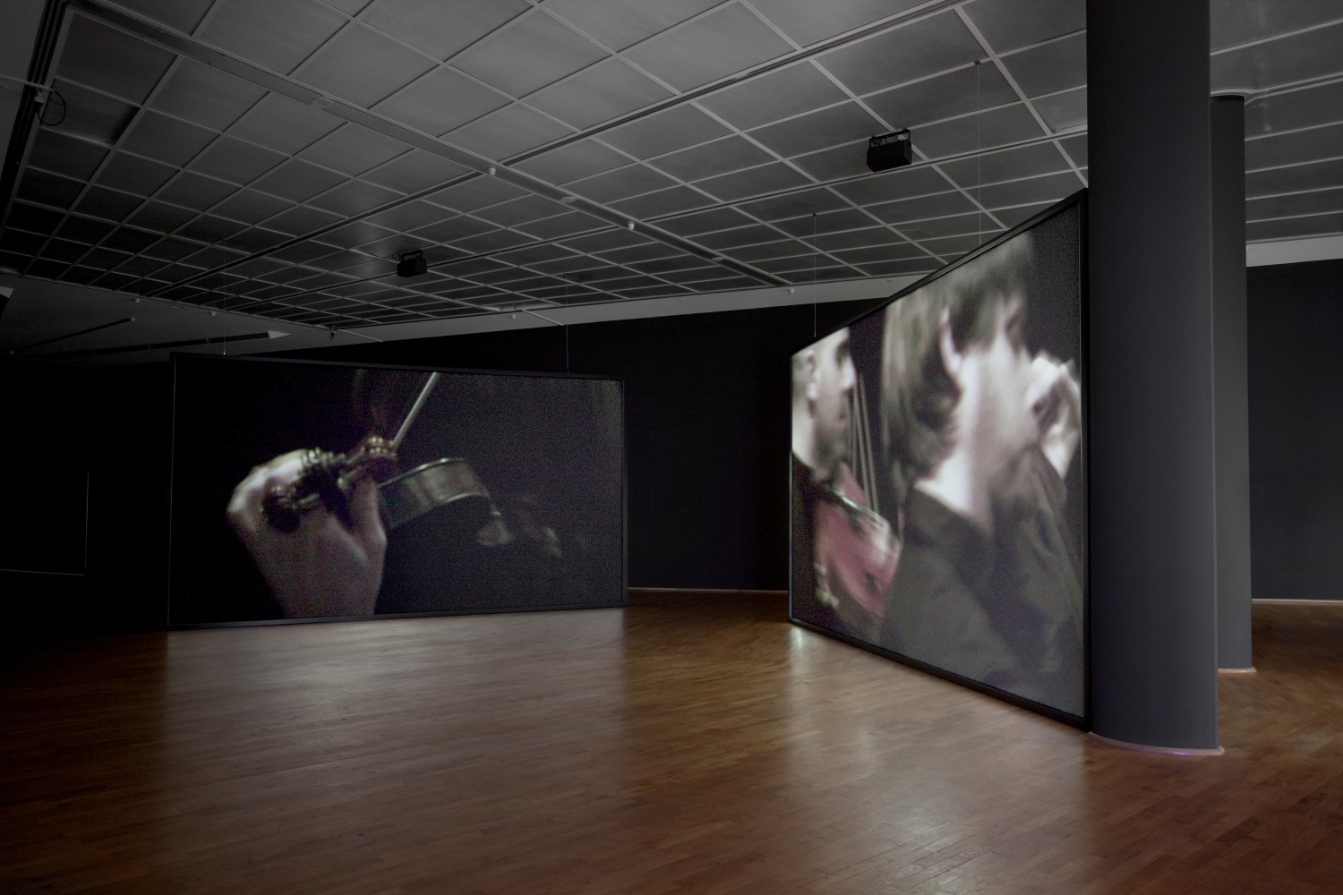 Installation view of video work by Douglas Gordon