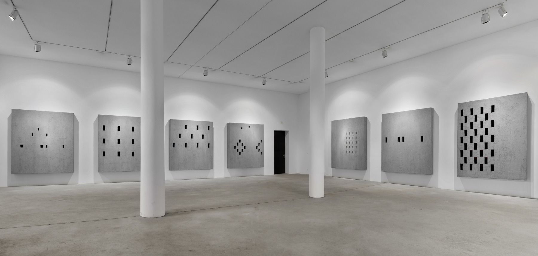 Installation view of wall works by Valentin Carron